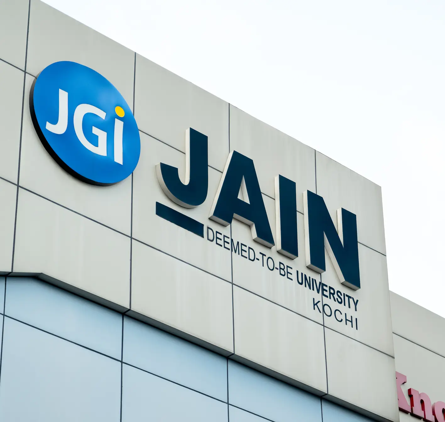 JAIN university signage on the Kochi campus building